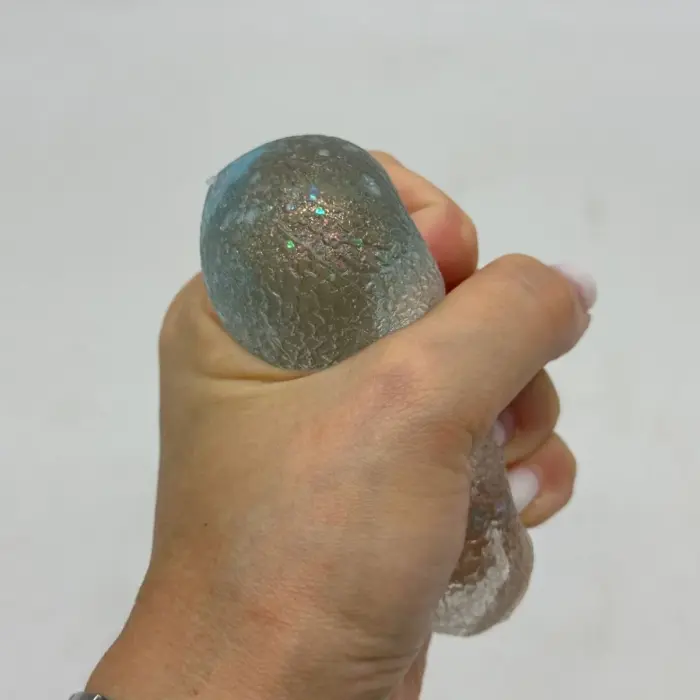 Сквіш антистресс "Крапля води з фігурними блискітками" 7cm (ПОМАРАНЧЕВИЙ)