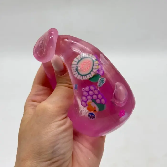 Сквиш антистресс "Бутылка с фруктами" 8cm (розовый)
