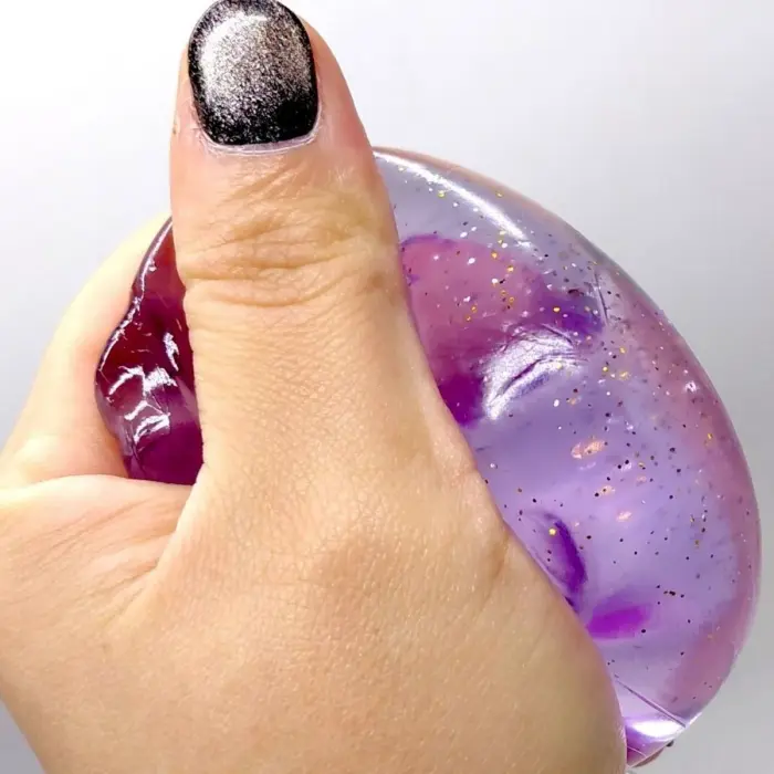 Іграшка-антистресс "Медуза" NeeDoh Jelly Squish Glow, 10 см (РОЖЕВИЙ)