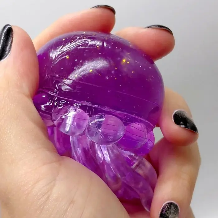 Іграшка-антистресс "Медуза" NeeDoh Jelly Squish Glow, 10 см (БУЗКОВИЙ)
